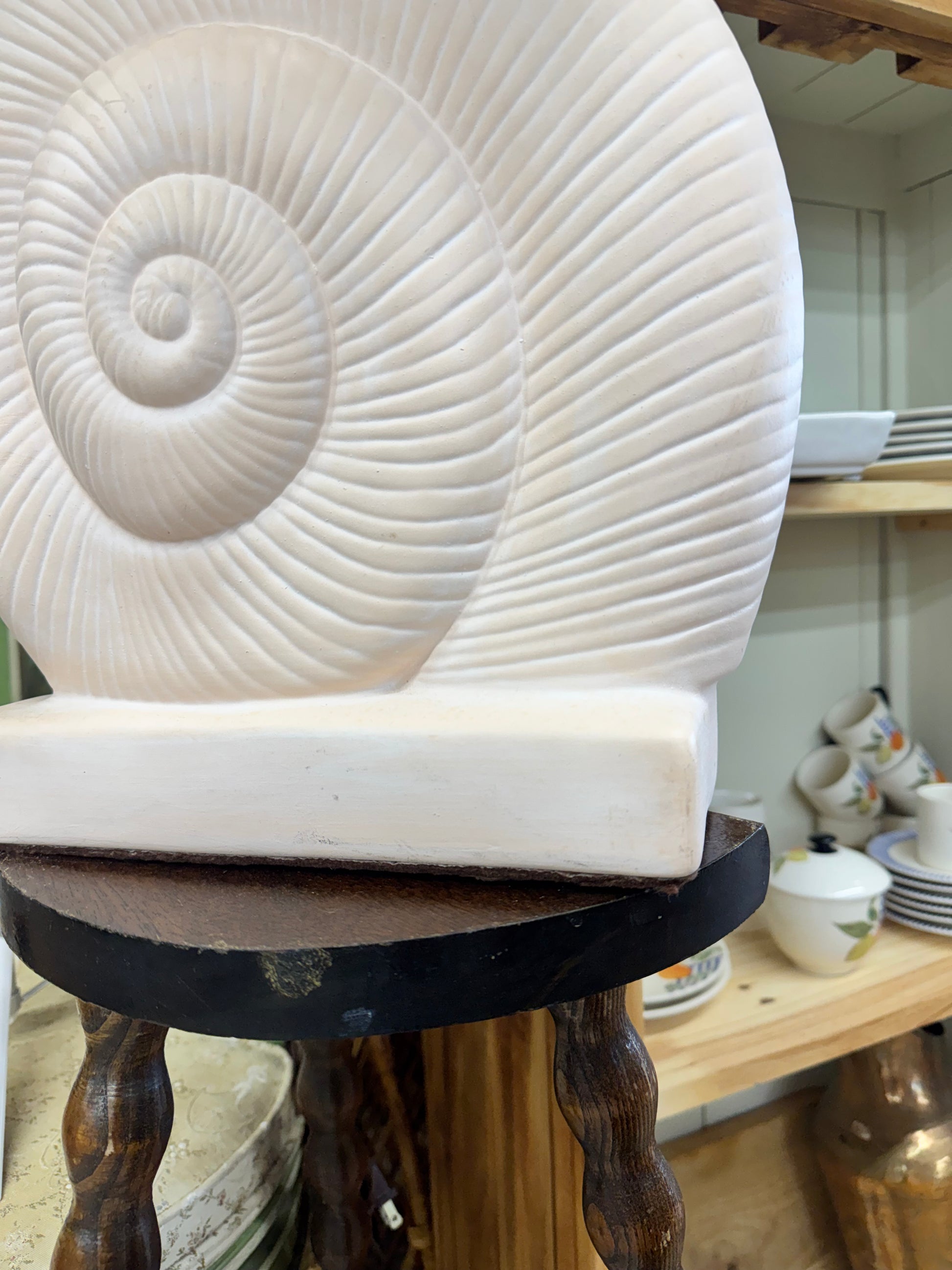 Vintage ceramic nautilus shell lamp base with sculptural spiral design