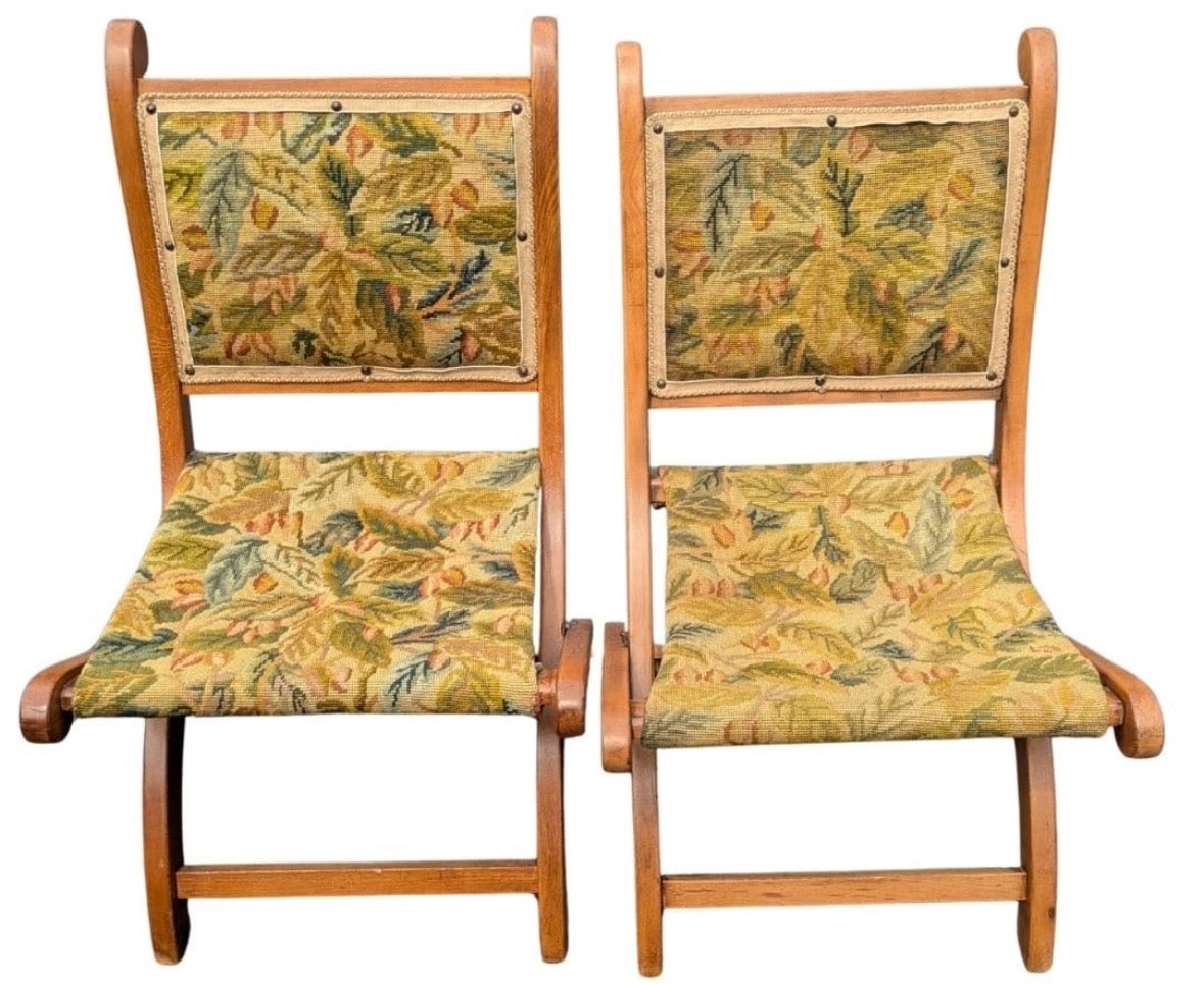 Detail of needlepoint textile on vintage folding oak chair