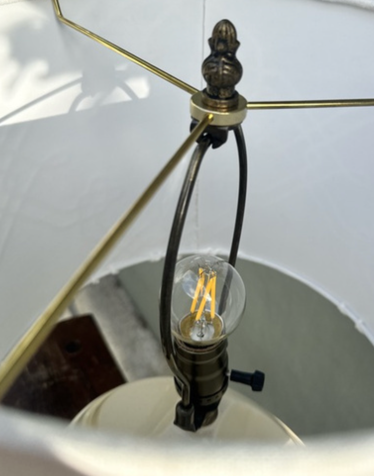 Restored coastal table lamp styled in an interior
