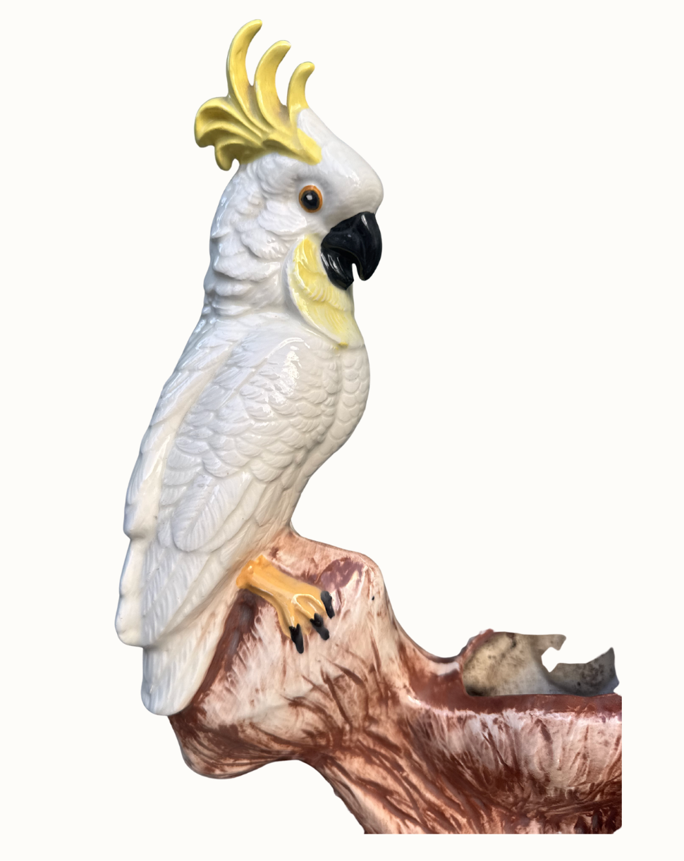 Vintage tropical bird sculpture and ceramic planter