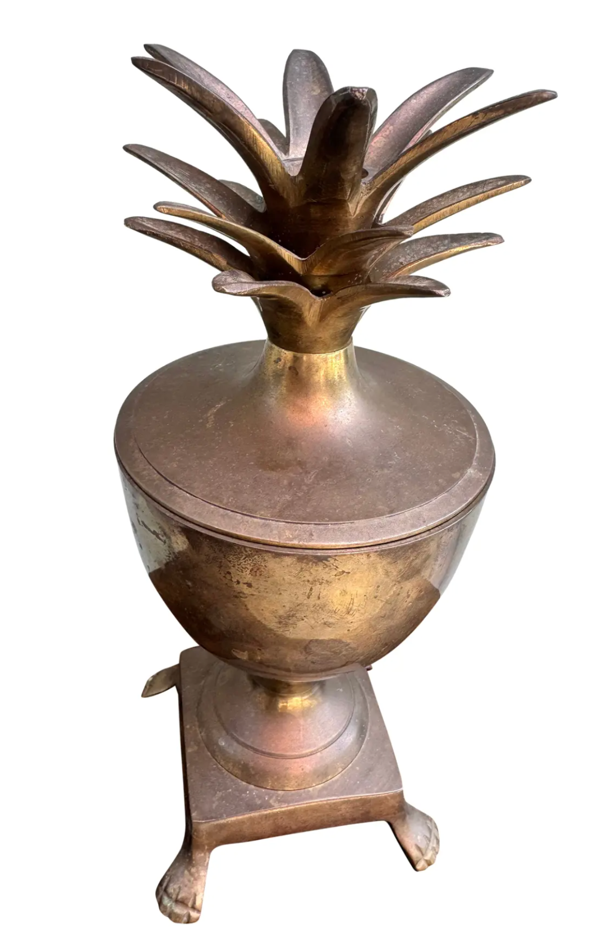 Vintage brass pineapple lidded urn on four paw feet