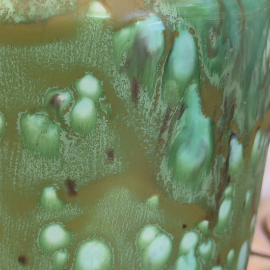 Vintage European studio art pottery baluster vase with green amber and turquoise drip glaze