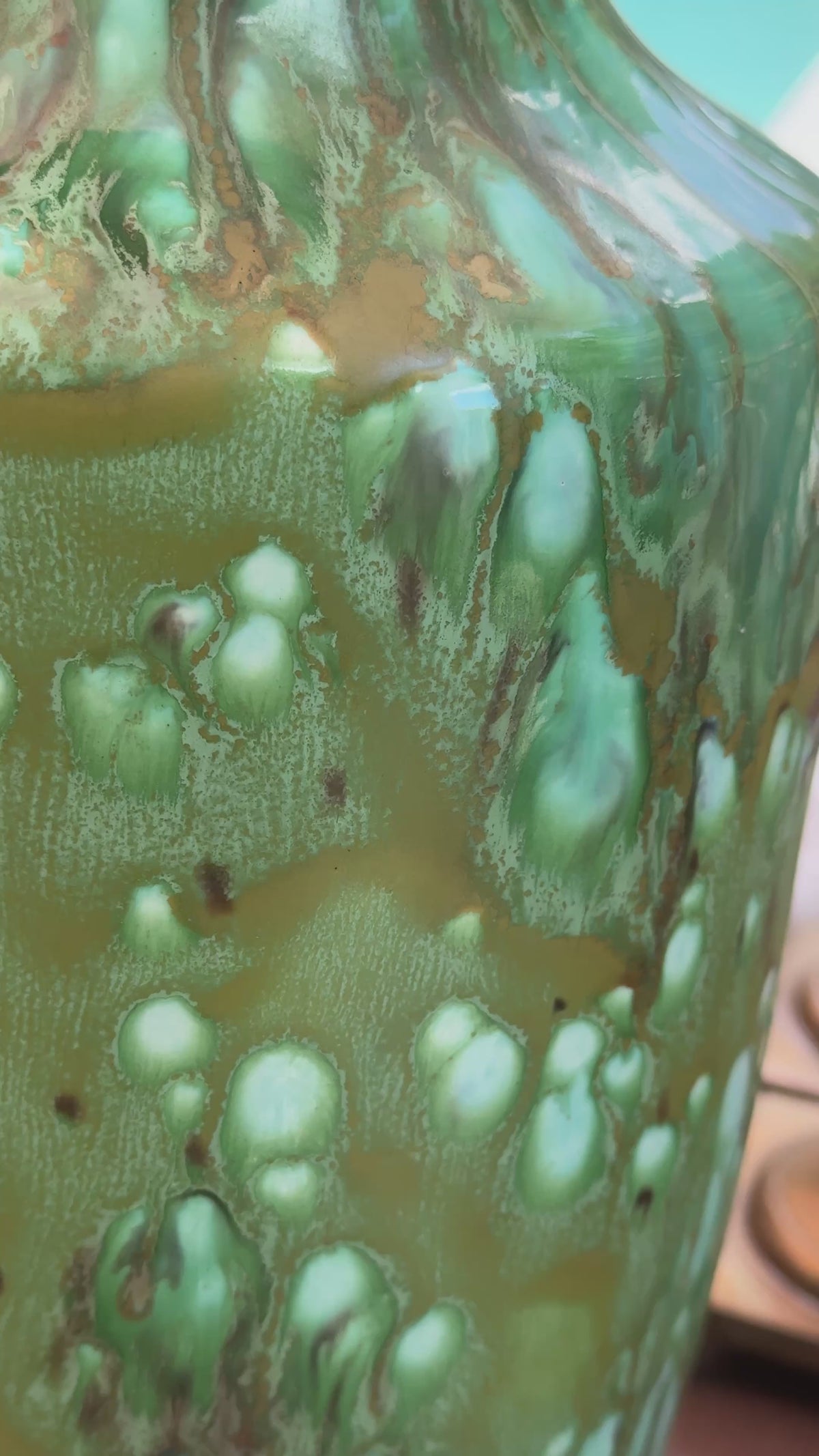 Vintage European studio art pottery baluster vase with green amber and turquoise drip glaze